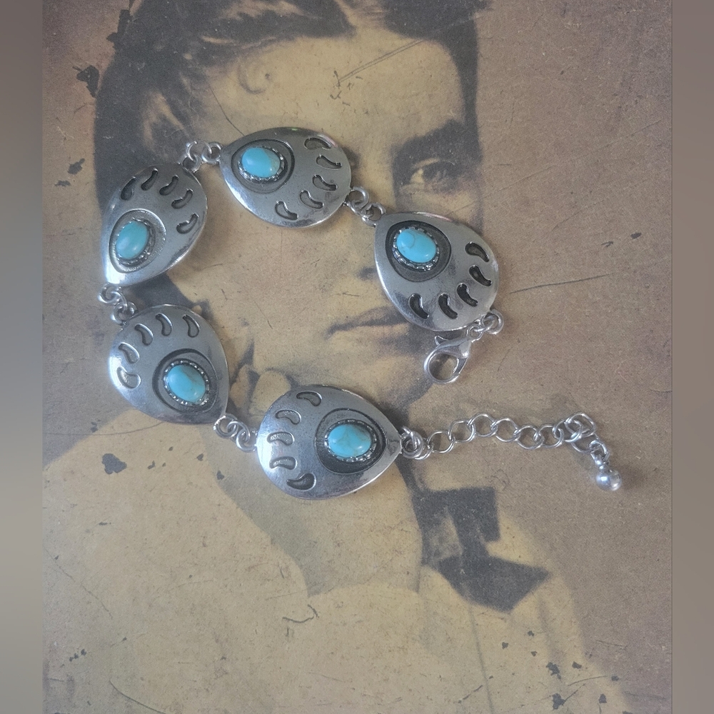 Stylish Silver Lined Bracelet with Turquoise Colored Stones